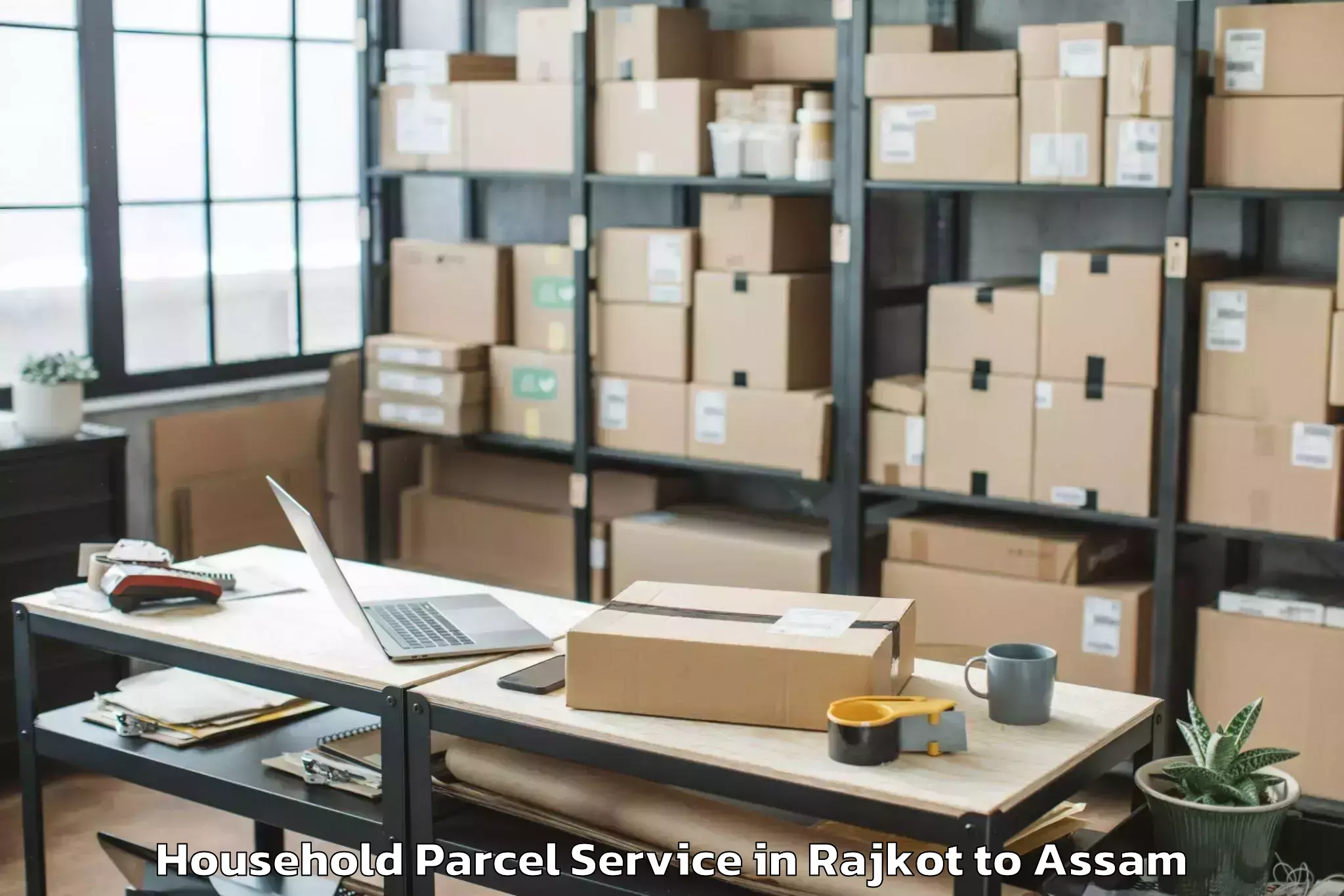 Top Rajkot to Dudhnoi Household Parcel Available